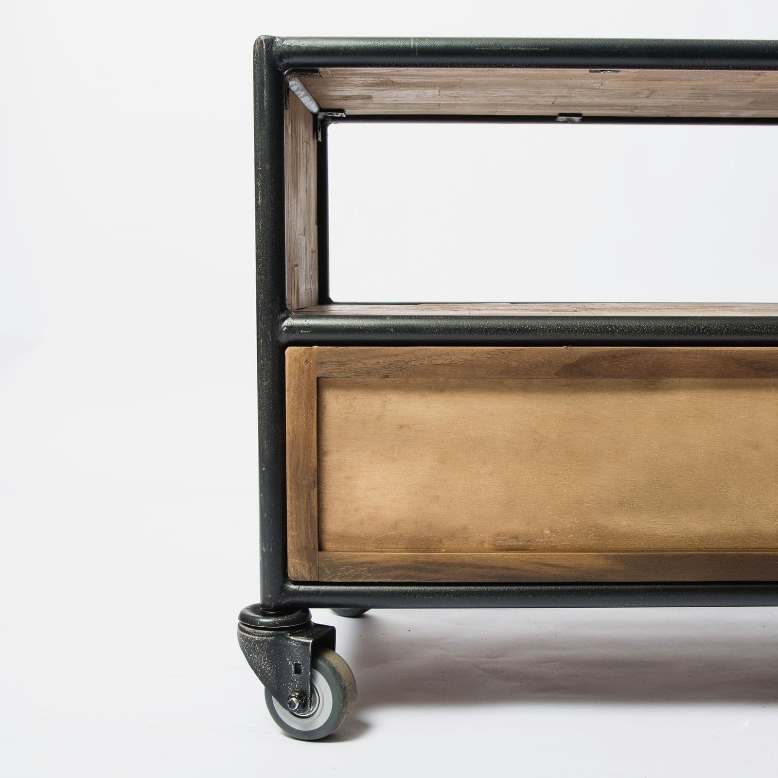 Industrial cart with a black metal frame and wood shelving on castor wheels